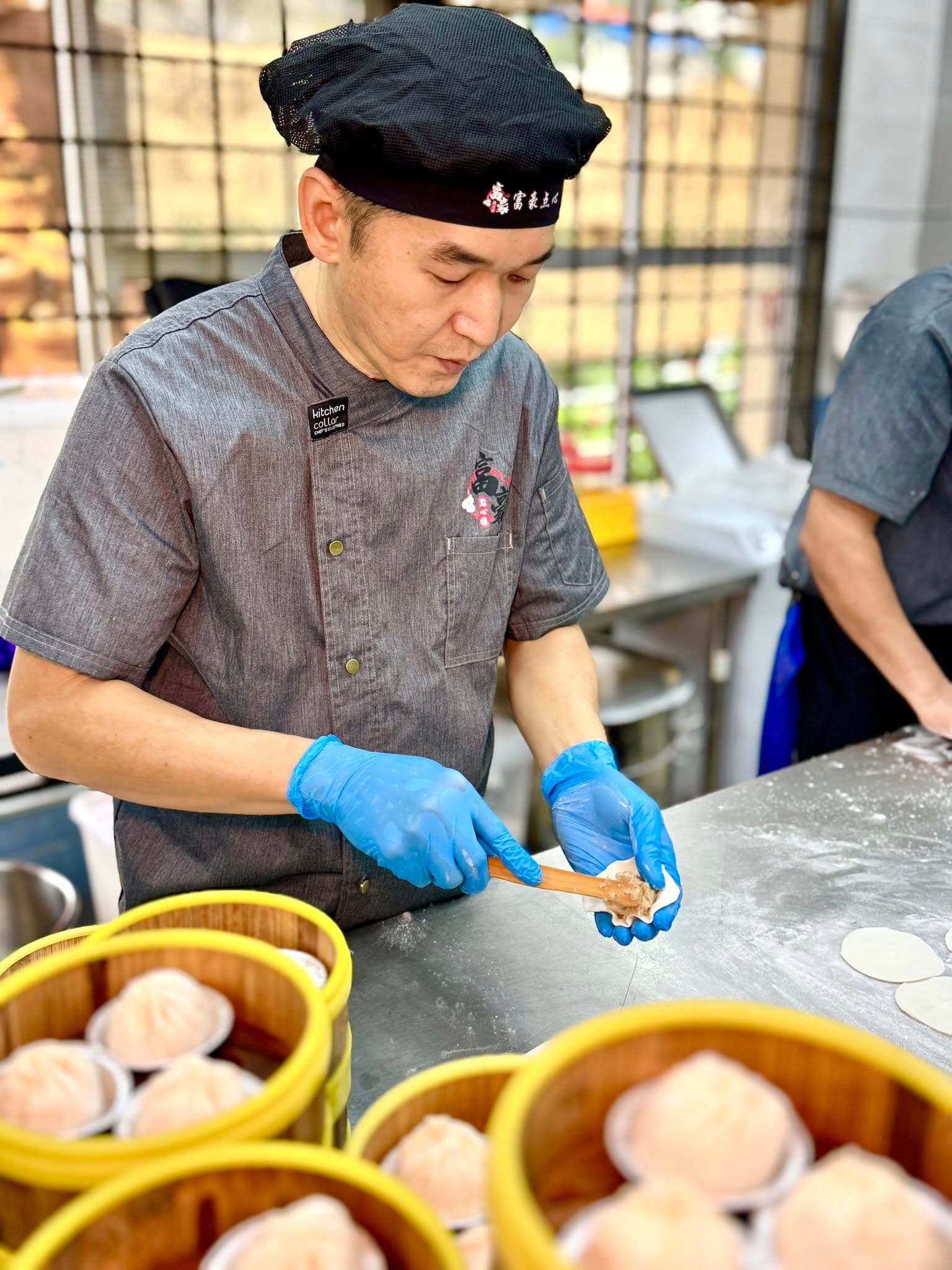 Foo Hou Dim Sum chef steaming handmade dim sum in kitchen