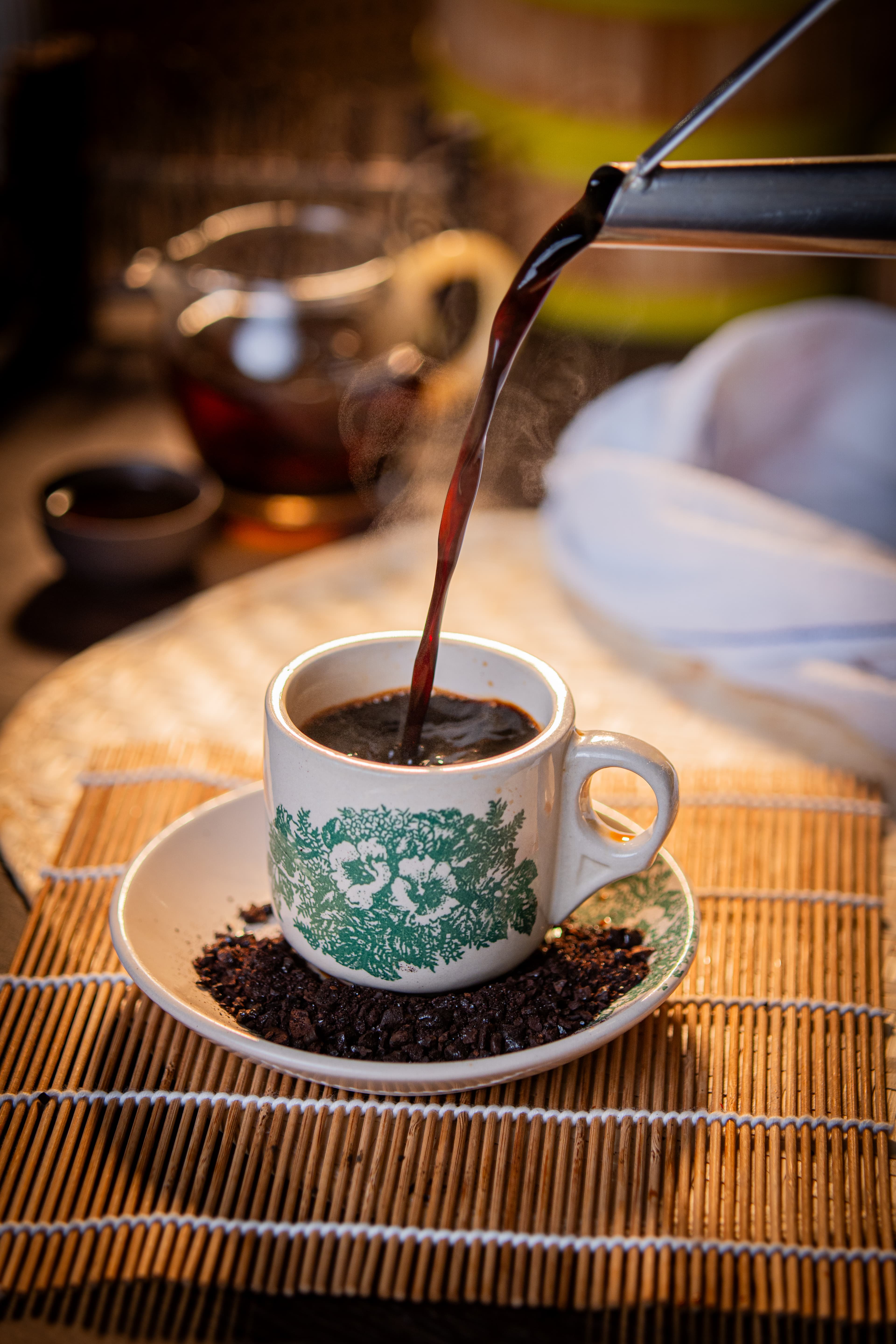 Foo Hou Dim Sum aged pu-erh tea poured in traditional teacup yum cha